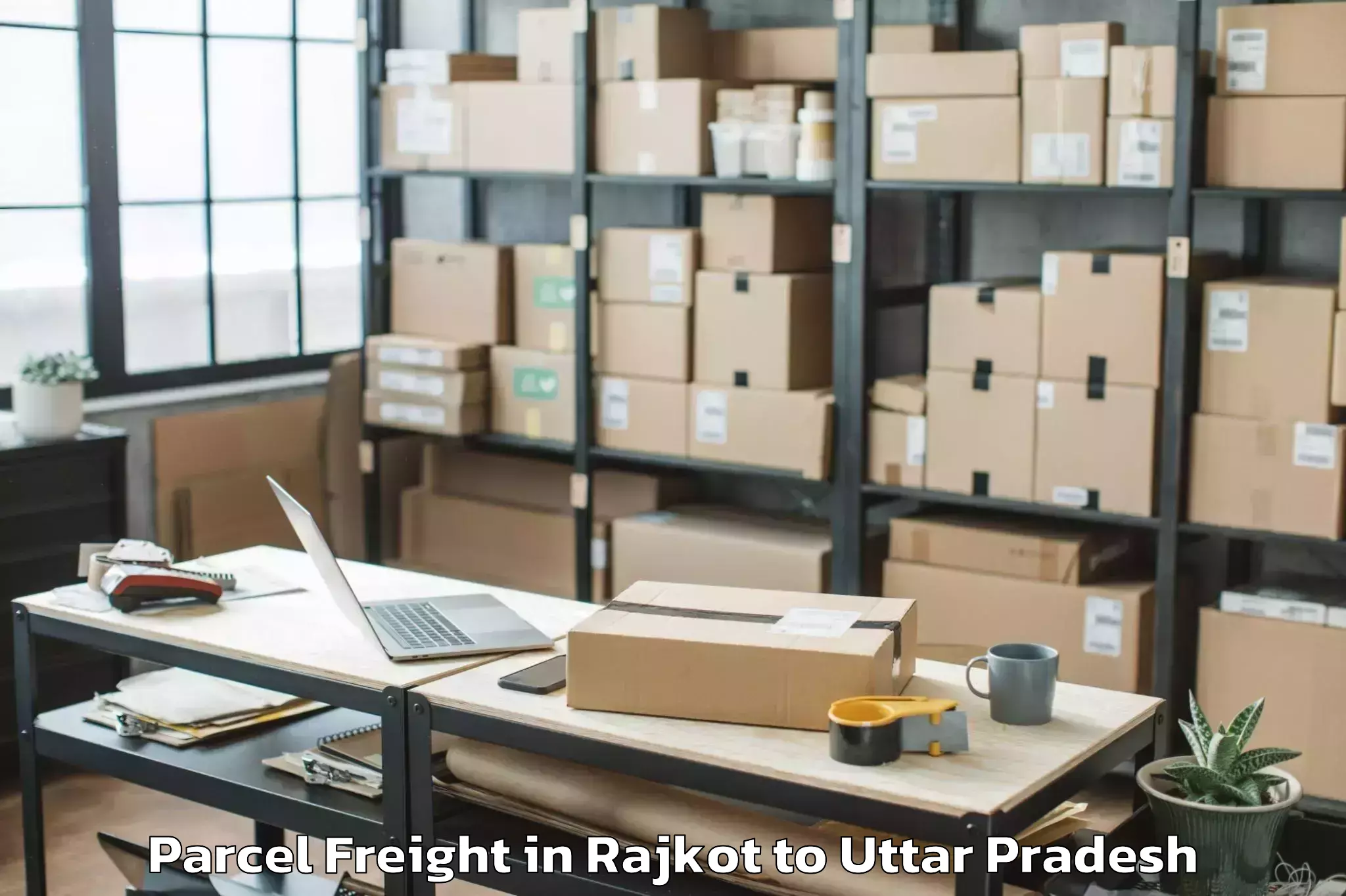 Easy Rajkot to Bhiti Parcel Freight Booking